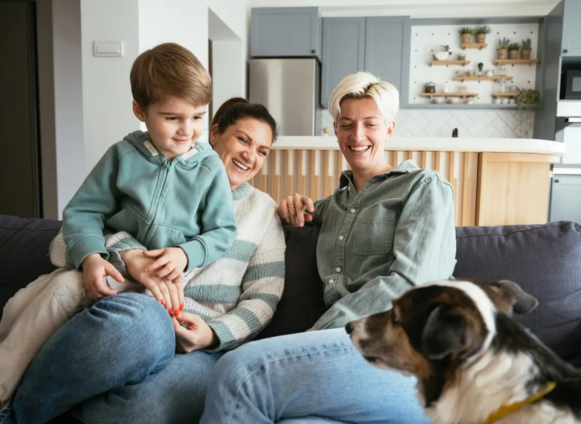Family Therapy. Lesbian couple with kids and dog
