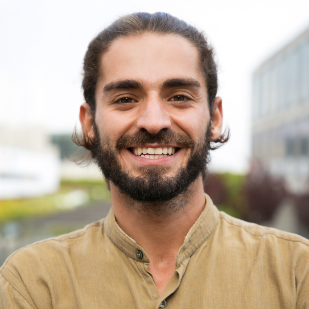 BFRB Therapy. Smiling man with a yellow shirt