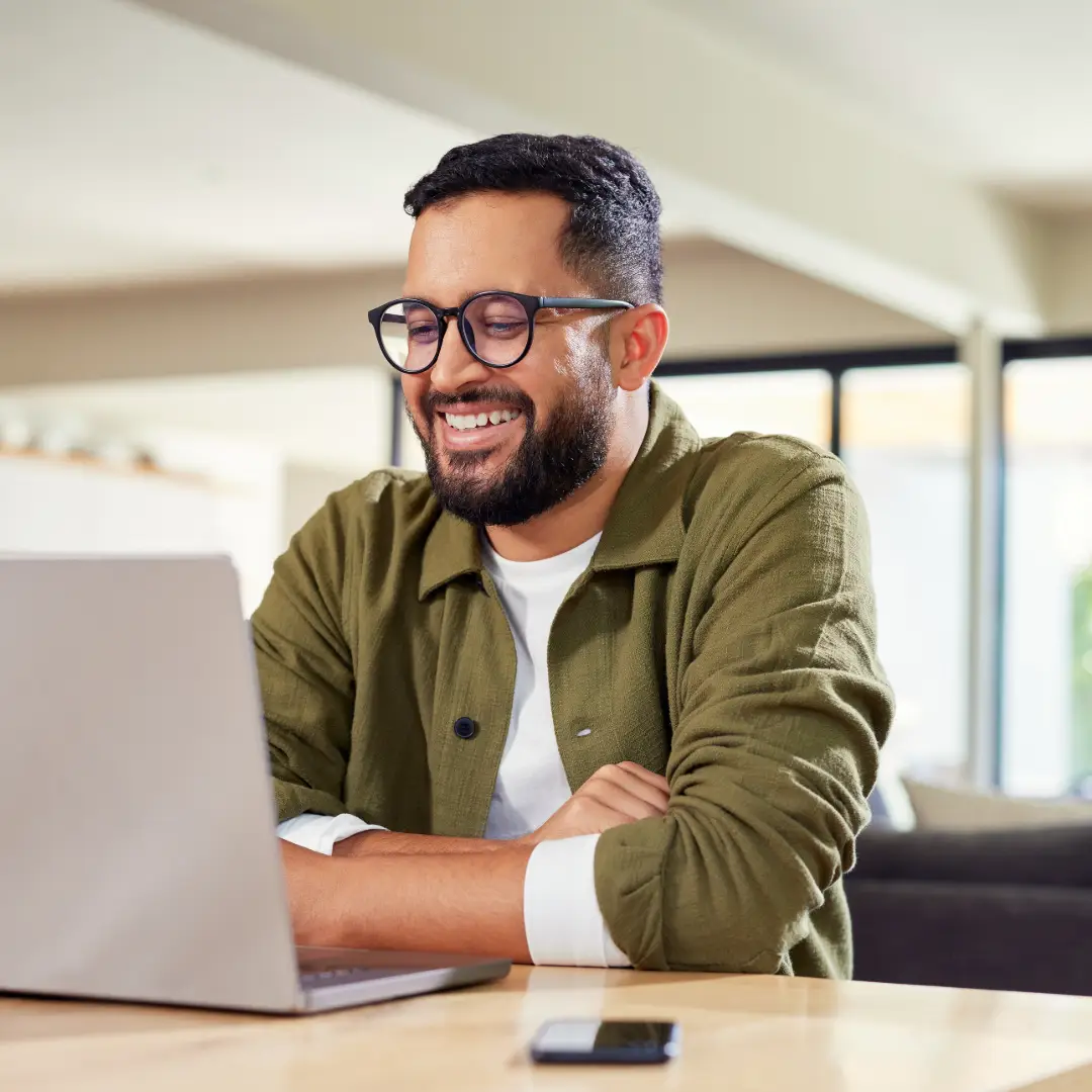 ACT Therapy. Man sitting at the table with a laptop