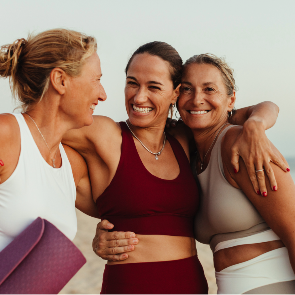 Three middle-aged women staying active and working out together